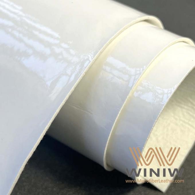 WINIWの堅い繊維のフットボールのための白いのどのMicrofiberの革